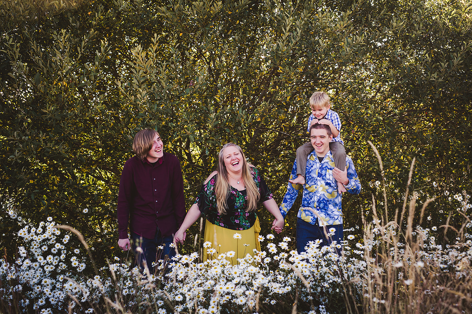 Family in a field of wildflowers